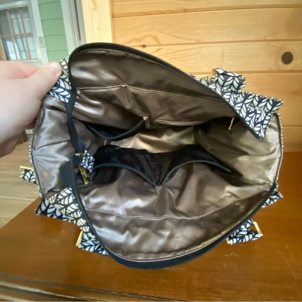 Jujube Be Classy spacious diaper bag tote for travel with black and white design